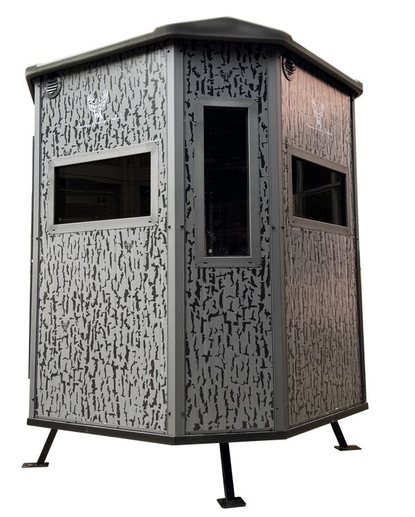 Monarch deer blind on tower stand in field setting